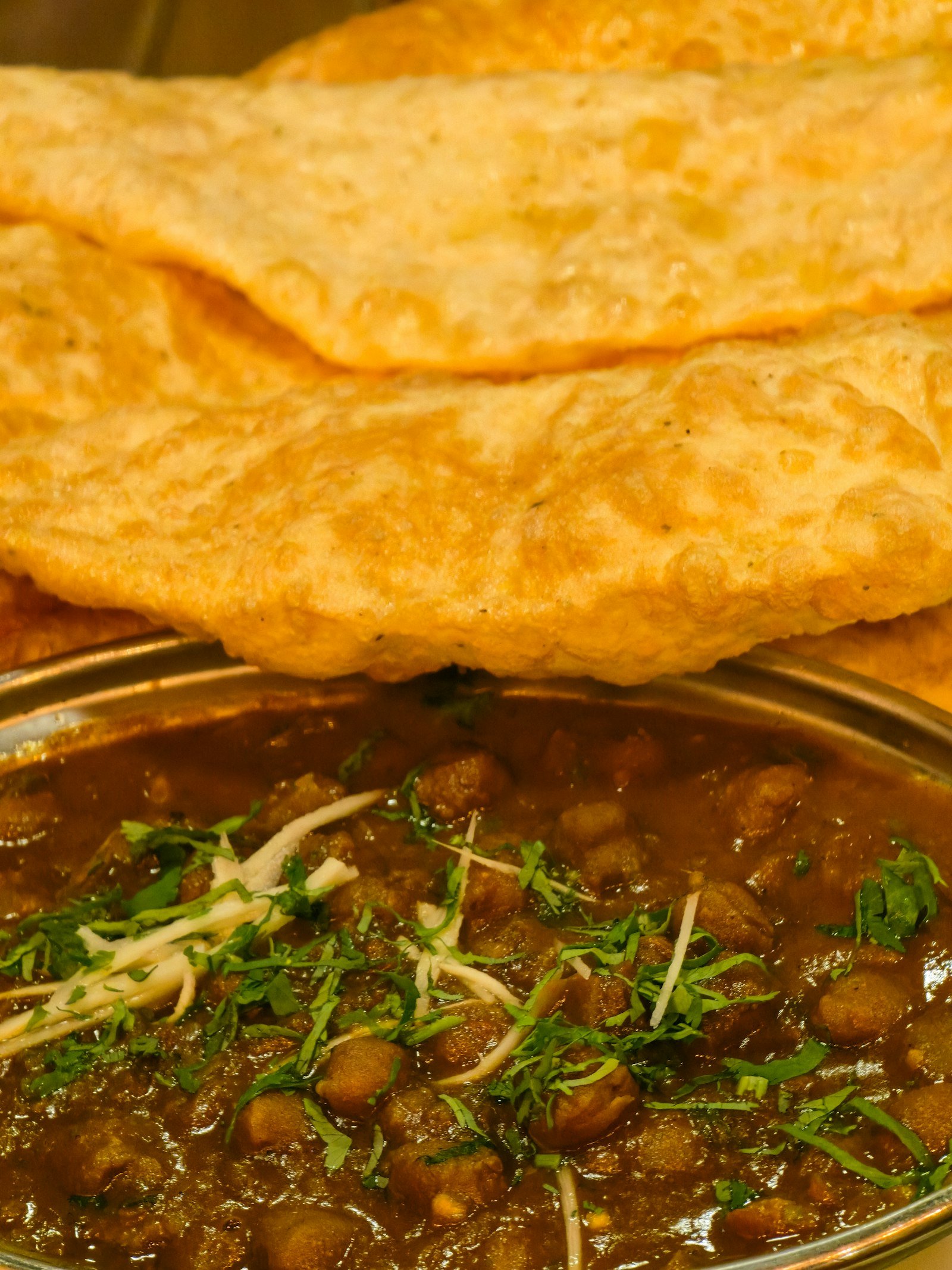 Punjabi chole bhature with fresh coriander at Maruti R Restaurant & Cafe