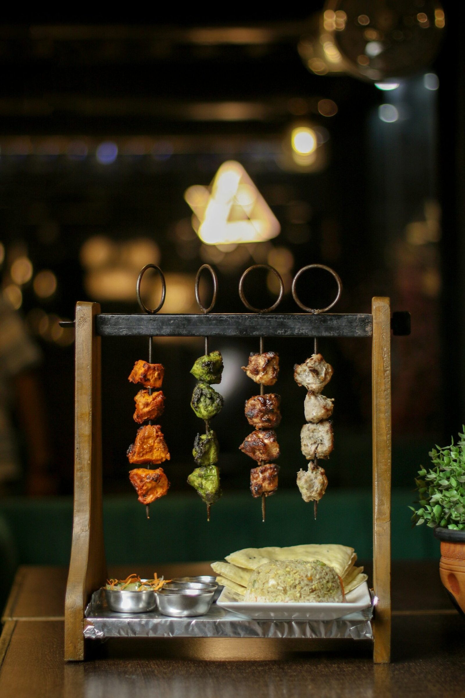 Grilled paneer tikka skewers from the tandoor – barbeque at Maruti R Restaurant & Cafe, Ahmedabad